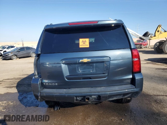 2020 Chevrolet Tahoe LT z VIN 1GNSKBKC2LR307442, wystawiony jako Copart lot #82393864 z przebiegiem Nie podano mil oraz Nie do naprawy • Non repairable. Historia ofert i sprzedaży dostępna na DreamBid. Obrazek 6.