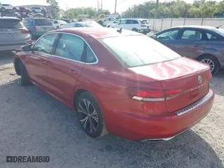 2021 Volkswagen Passat 2.0T SE with VIN 1VWSA7A30MC007748, listed as a IAAI auction lot 41843136 with 34,467 mi miles. Bid and sale history available at carsss.com. Image 3.