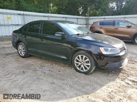 2012 Volkswagen Jetta SE with VIN 3VWDX7AJ0CM314940, listed as a Copart auction lot 61930085 with 221,356 mi miles and Salvage title. Bid and sale history available at DreamBid. Image 4.