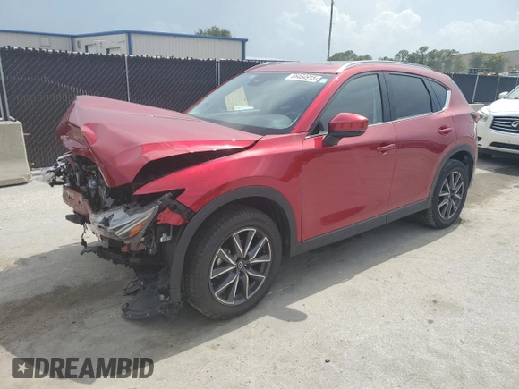 2018 Mazda CX-5 Grand Touring with VIN JM3KFADM4J1395832, listed as a Copart auction lot 66464915 with 41,410 mi miles and Salvage title. Bid and sale history available at DreamBid. Image 1.