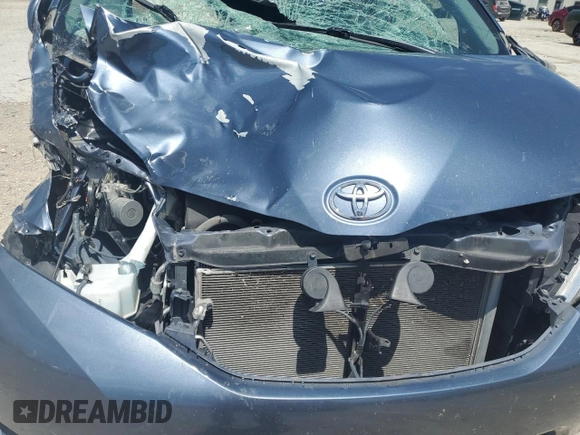 2015 Toyota Sienna LE with VIN 5TDJK3DC4FS107711, listed as a Copart auction lot 57693005 with 141,370 mi miles and Salvage title. Bid and sale history available at DreamBid. Image 12.