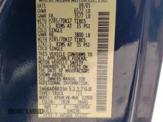 2006 Nissan Titan SE z VIN 1N6BA06B86N511768, wystawiony jako Copart lot #52146585 z przebiegiem 174 058 mil mil oraz Szkoda całkowita • Salvage title. Historia ofert i sprzedaży dostępna na DreamBid. Obrazek 12.