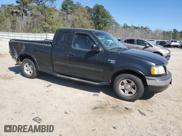 1999 Ford F-150 with VIN 1FTRX17W0XNA48744, listed as a Copart auction lot 49479635 with Not Provided miles and Salvage Title. Bid and sale history available at DreamBid. Image 4.