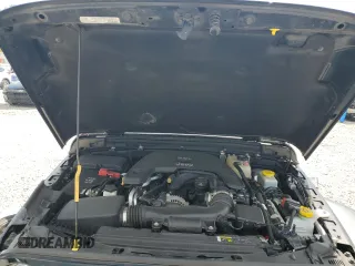 2019 Jeep Wrangler Unlimited Sport S with VIN 1C4HJXDG2KW570078, listed as a Copart auction lot 51119485 with 65,860 mi miles and Salvage title. Bid and sale history available at DreamBid. Image 11.