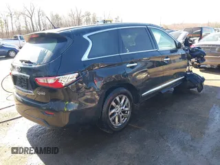 2015 Infiniti QX60 with VIN 5N1AL0MM5FC500781, listed as a IAAI auction lot 41850668 with 104,811 mi miles. Bid and sale history available at carsss.com. Image 4.
