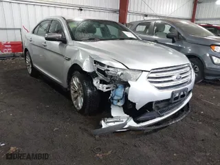 2014 Ford Taurus Limited with VIN 1FAHP2F81EG101351, listed as a IAAI auction lot 41662308 with 139,542 mi miles. Bid and sale history available at carsss.com. Image 1.