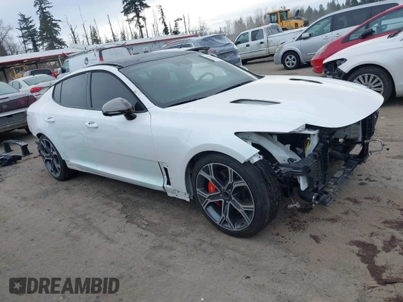 2021 Kia Stinger GT2 with VIN KNAE55LC5M6097982, listed as a IAAI auction lot 41568157 with 57,836 mi miles. Bid and sale history available at carsss.com. Image 1.