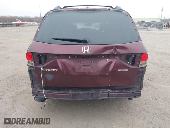 2014 Honda Odyssey Touring with VIN 5FNRL5H97EB117971, listed as a IAAI auction lot 41794324 with 198,191 mi miles and . Bid and sale history available at DreamBid. Image 6.
