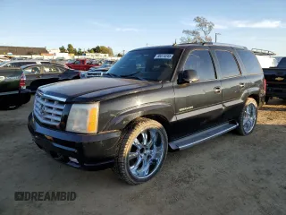 2003 Cadillac Escalade z VIN 1GYEC63TX3R135227, wystawiony jako Copart lot #88373245 z przebiegiem 258 595 mil mil oraz Czysty tytuł • Clean title. Historia ofert i sprzedaży dostępna na DreamBid. Obrazek 1.