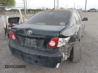 2010 Toyota Corolla with VIN 2T1BU4EE2AC300882, listed as a IAAI auction lot 41842125 with 234,967 mi miles. Bid and sale history available at carsss.com. Image 4.
