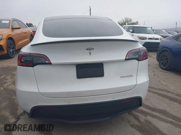 2022 Tesla Model Y Performance with VIN 7SAYGDEF0NF400560, listed as a IAAI auction lot 41783912 with 36,513 mi miles and . Bid and sale history available at DreamBid. Image 16.