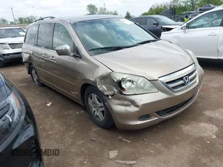 2006 Honda Odyssey EX with VIN 5FNRL38466B402154, listed as a IAAI auction lot 42163774 with 230,147 mi miles and . Bid and sale history available at DreamBid. Image 1.