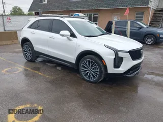 2024 Cadillac XT4 AWD Sport with VIN 1GYFZFR40RF223782, listed as a IAAI auction lot 42295745 with 7,254 mi miles and . Bid and sale history available at DreamBid. Image 1.