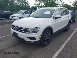 2018 Volkswagen Tiguan SEL with VIN 3VV2B7AX4JM012840, listed as a IAAI auction lot 42263511 with 105,510 mi miles and . Bid and sale history available at DreamBid. Image 18.