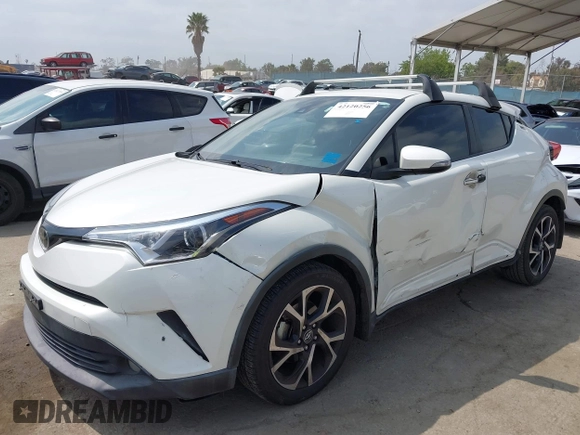 2019 Toyota C-HR XLE with VIN JTNKHMBX9K1054053, listed as a IAAI auction lot 42120256 with 67,083 mi miles and . Bid and sale history available at DreamBid. Image 2.