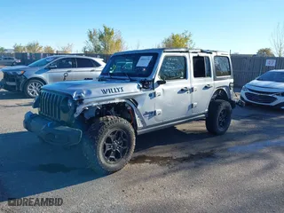 2023 Jeep Wrangler 4xe with VIN 1C4JJXN62PW628429, listed as a IAAI auction lot 40861135 with 33,923 mi miles. Bid and sale history available at carsss.com. Image 17.
