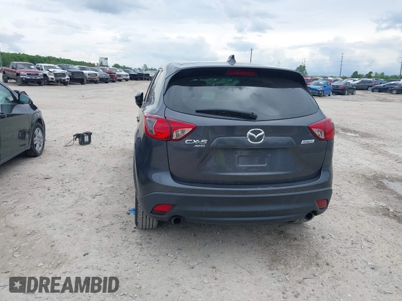 2014 Mazda CX-5 Sport z VIN JM3KE4BE6E0404753, wystawiony jako IAAI lot #42260554 z przebiegiem 144 688 mil mil oraz . Historia ofert i sprzedaży dostępna na DreamBid. Obrazek 16.