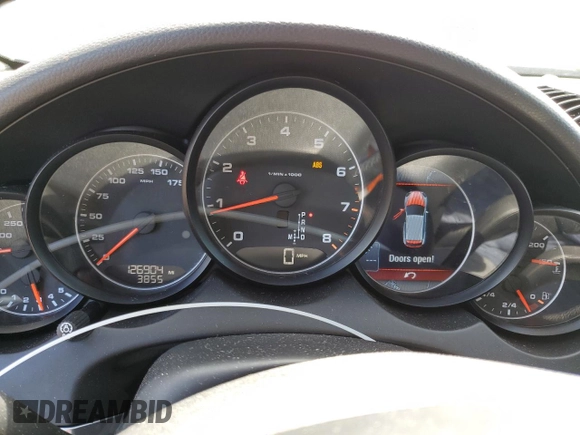 2011 Porsche Cayenne with VIN WP1AA2A21BLA04765, listed as a Copart auction lot 55946445 with 126,904 mi miles and Salvage title. Bid and sale history available at DreamBid. Image 9.