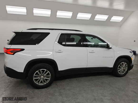 2023 Chevrolet Traverse LT Cloth with VIN 1GNERGKW2PJ135658, listed as a Copart auction lot 50096105 with 77,398 mi miles and Clean Title. Bid and sale history available at carsss.com. Image 3.