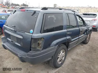 2004 Jeep Grand Cherokee Laredo with VIN 1J4GX48S64C291075, listed as a IAAI auction lot 41805747 with 282,384 mi miles. Bid and sale history available at carsss.com. Image 4.