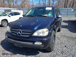 2003 Mercedes-Benz M-Class 3.7L with VIN 4JGAB57E03A418713, listed as a IAAI auction lot 41835875 with 195,982 mi miles. Bid and sale history available at carsss.com. Image 6.