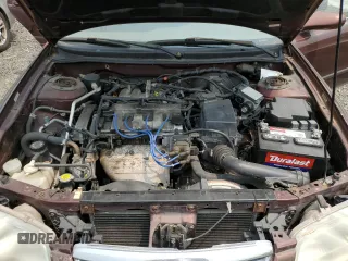 2000 Mazda 626 LX z VIN 1YVGF22C4Y5112874, wystawiony jako Copart lot #58952175 z przebiegiem 100 070 mil mil oraz Szkoda całkowita • Salvage title. Historia ofert i sprzedaży dostępna na DreamBid. Obrazek 11.