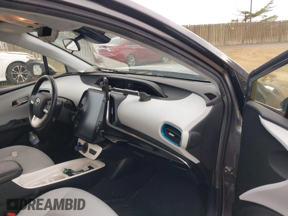 2018 Toyota Prius Plus with VIN JTDKARFP6J3078362, listed as a IAAI auction lot 42021835 with 61,170 mi miles and . Bid and sale history available at DreamBid. Image 5.