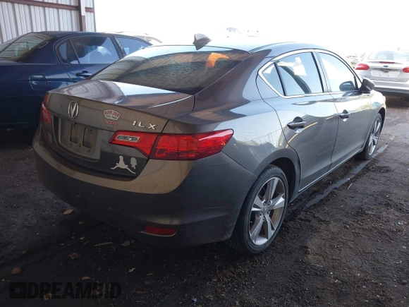 2014 Acura ILX Premium with VIN 19VDE1F51EE006621, listed as a IAAI auction lot 41984539 with 165,585 mi miles and . Bid and sale history available at DreamBid. Image 4.
