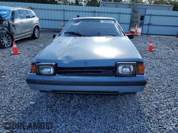 1983 Toyota Celica z VIN JT2RA64L7D6174381, wystawiony jako Copart lot #75986554 z przebiegiem 312 583 mil mil oraz Szkoda całkowita • Salvage title. Historia ofert i sprzedaży dostępna na DreamBid. Obrazek 5.
