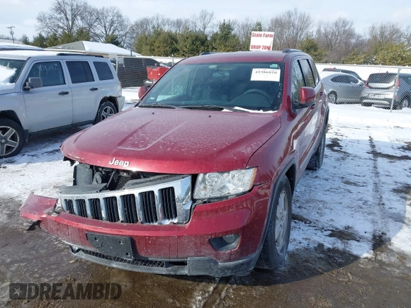 2013 Jeep Grand Cherokee Laredo with VIN 1C4RJFAG4DC572986, listed as a IAAI auction lot 41586820 with 100,899 mi miles. Bid and sale history available at carsss.com. Image 18.