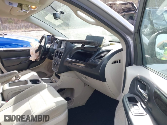 2014 Dodge Grand Caravan SXT with VIN 2C4RDGCG4ER106106, listed as a IAAI auction lot 41830512 with 135,044 mi miles and . Bid and sale history available at DreamBid. Image 5.