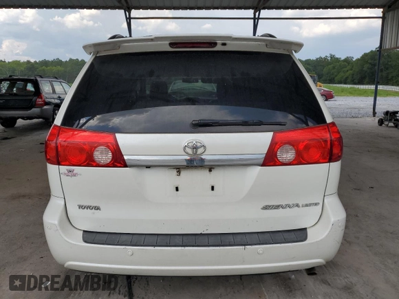 2010 Toyota Sienna XLE with VIN 5TDYK4CCXAS335064, listed as a Copart auction lot 62649665 with 246,327 mi miles and Salvage title. Bid and sale history available at DreamBid. Image 6.