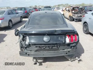 2015 Ford Mustang EcoBoost with VIN 1FA6P8THXF5395540, listed as a IAAI auction lot 41812384 with 118,150 mi miles and . Bid and sale history available at carsss.com. Image 16.