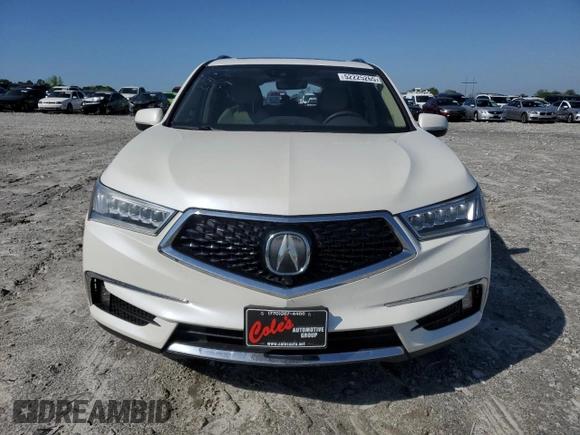 2017 Acura MDX Advance z VIN 5FRYD4H88HB010473, wystawiony jako Copart lot #52225265 z przebiegiem 80 307 mil mil oraz Szkoda całkowita • Salvage title. Historia ofert i sprzedaży dostępna na DreamBid. Obrazek 5.
