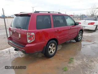 2006 Honda Pilot EX with VIN 5FNYF28476B025864, listed as a IAAI auction lot 41878122 with Not Provided miles and . Bid and sale history available at DreamBid. Image 4.