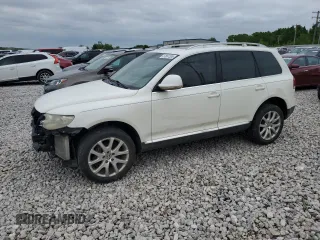 2009 Volkswagen Touareg V6 z VIN WVGFM77L59D036629, wystawiony jako Copart lot #57887335 z przebiegiem 204 944 mil mil oraz Czysty tytuł • Clean title. Historia ofert i sprzedaży dostępna na DreamBid. Obrazek 1.