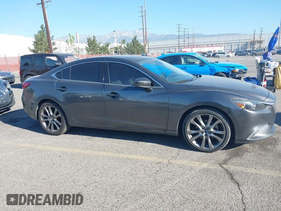 2017 Mazda 6 Grand Touring with VIN JM1GL1W51H1137470, listed as a IAAI auction lot 41872756 with 132,564 mi miles. Bid and sale history available at carsss.com. Image 13.