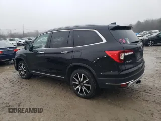2020 Honda Pilot Touring 7-Passenger z VIN 5FNYF6H67LB003593, wystawiony jako Copart lot #83658334 z przebiegiem 105 575 mil mil oraz Szkoda całkowita • Salvage title. Historia ofert i sprzedaży dostępna na DreamBid. Obrazek 2.