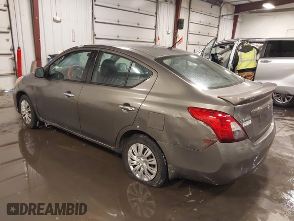 2014 Nissan Versa SV with VIN 3N1CN7AP2EK455471, listed as a IAAI auction lot 41585696 with 167,366 mi miles. Bid and sale history available at carsss.com. Image 3.