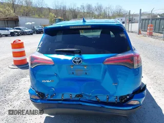 2018 Toyota RAV4 LE with VIN JTMZFREV4JJ734702, listed as a IAAI auction lot 41987540 with 141,526 mi miles. Bid and sale history available at carsss.com. Image 6.