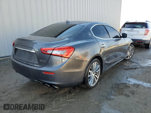 2015 Maserati Ghibli with VIN ZAM57XSA6F1158292, listed as a Copart auction lot 61963552 with 47,004 mi miles. Bid and sale history available at carsss.com. Image 4.