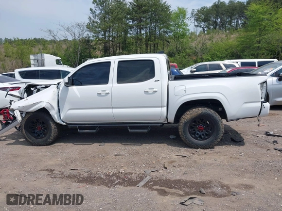 2021 Toyota Tacoma 4WD SR with VIN 3TMCZ5AN2MM414975, listed as a IAAI auction lot 41997227 with 57,729 mi miles. Bid and sale history available at carsss.com. Image 14.