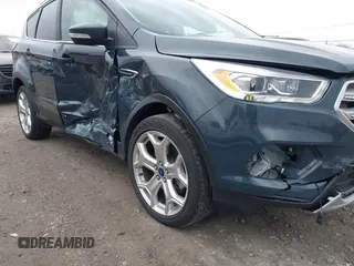 2019 Ford Escape Titanium with VIN 1FMCU9J95KUC28621, listed as a IAAI auction lot 41825297 with 60,373 mi miles. Bid and sale history available at carsss.com. Image 17.