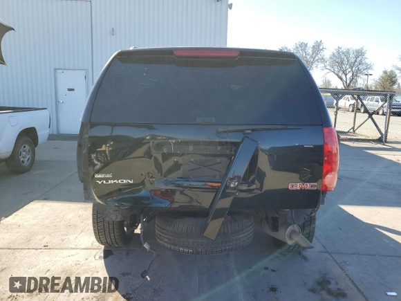 2009 GMC Yukon SLT w/4SB with VIN 1GKFK33059R106202, listed as a Copart auction lot 46700985 with 156,709 mi miles and Salvage Title. Bid and sale history available at carsss.com. Image 6.
