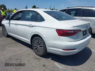2021 Volkswagen Jetta S z VIN 3VWC57BU4MM037088, wystawiony jako IAAI lot #42087111 z przebiegiem 82 728 mil mil oraz . Historia ofert i sprzedaży dostępna na DreamBid. Obrazek 3.