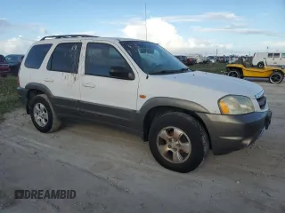 2002 Mazda Tribute LX with VIN 4F2YU09182KM09244, listed as a Copart auction lot 76758954 with Not Provided miles and Non Repairable. Bid and sale history available at carsss.com. Image 4.