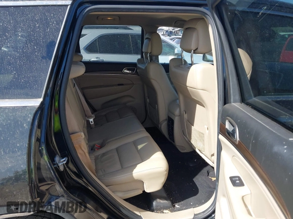 2014 Jeep Grand Cherokee Limited with VIN 1C4RJEBM4EC353610, listed as a IAAI auction lot 41830079 with 168,160 mi miles. Bid and sale history available at carsss.com. Image 8.