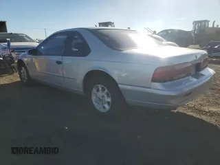 1995 Ford Thunderbird LX with VIN 1FALP62W4SH187234, listed as a Copart auction lot 86122364 with 57,256 mi miles and Clean Title. Bid and sale history available at DreamBid. Image 2.