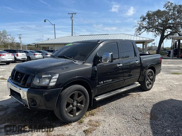 2011 Nissan Titan SV with VIN 1N6BA0ED0BN306474, listed as a Copart auction lot 46661905 with 239,525 mi miles and Clean Title. Bid and sale history available at DreamBid. Image 2.