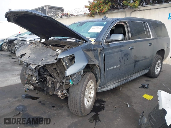 2020 Chevrolet Suburban LT z VIN 1GNSCHKC8LR151570, wystawiony jako IAAI lot #41677348 z przebiegiem Nie podano mil oraz . Historia ofert i sprzedaży dostępna na DreamBid. Obrazek 18.